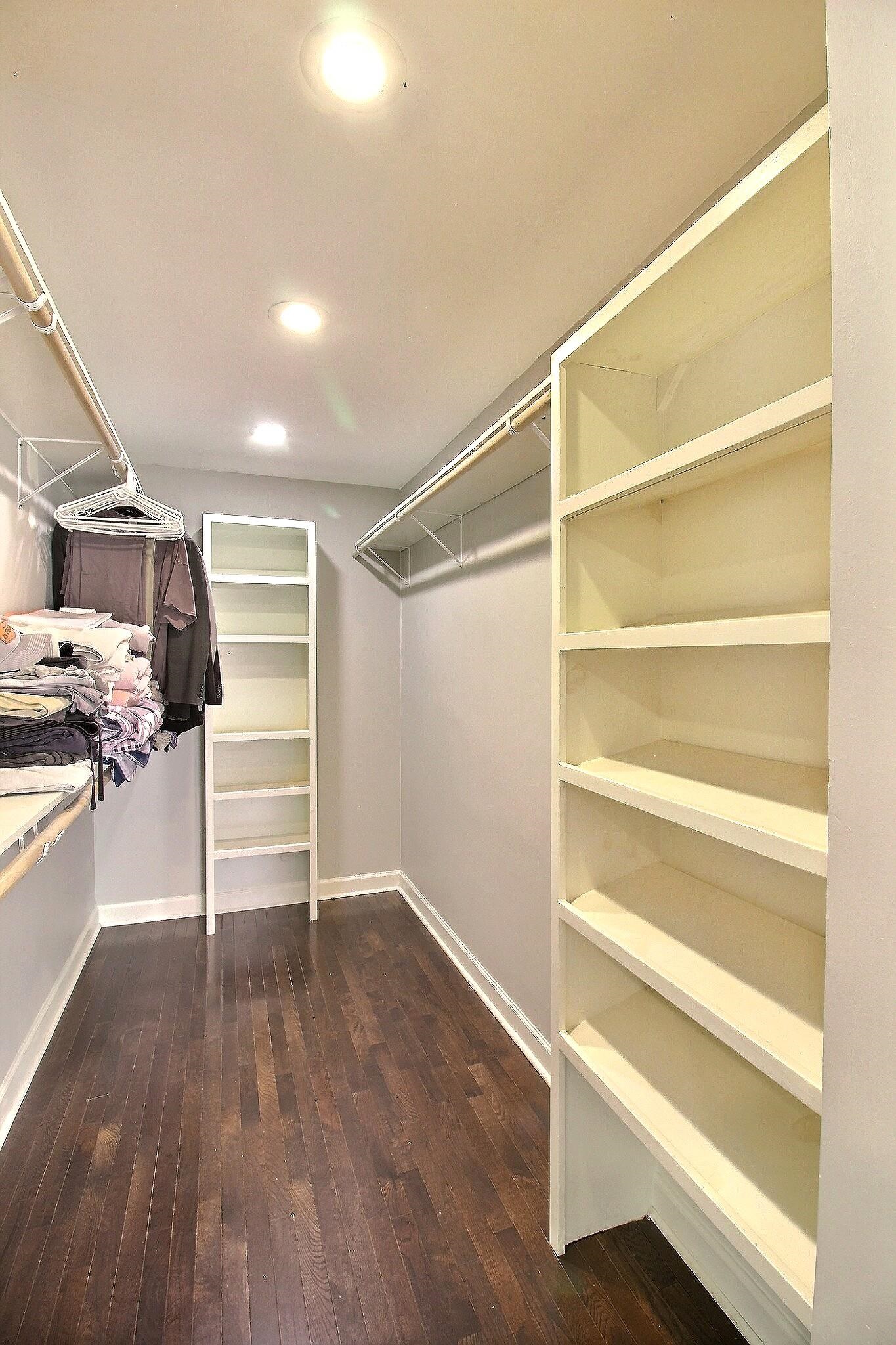 7572 Willey Road Germantown, TN 38138 - Photo 15 of 30 a view of walk in closet with empty racks