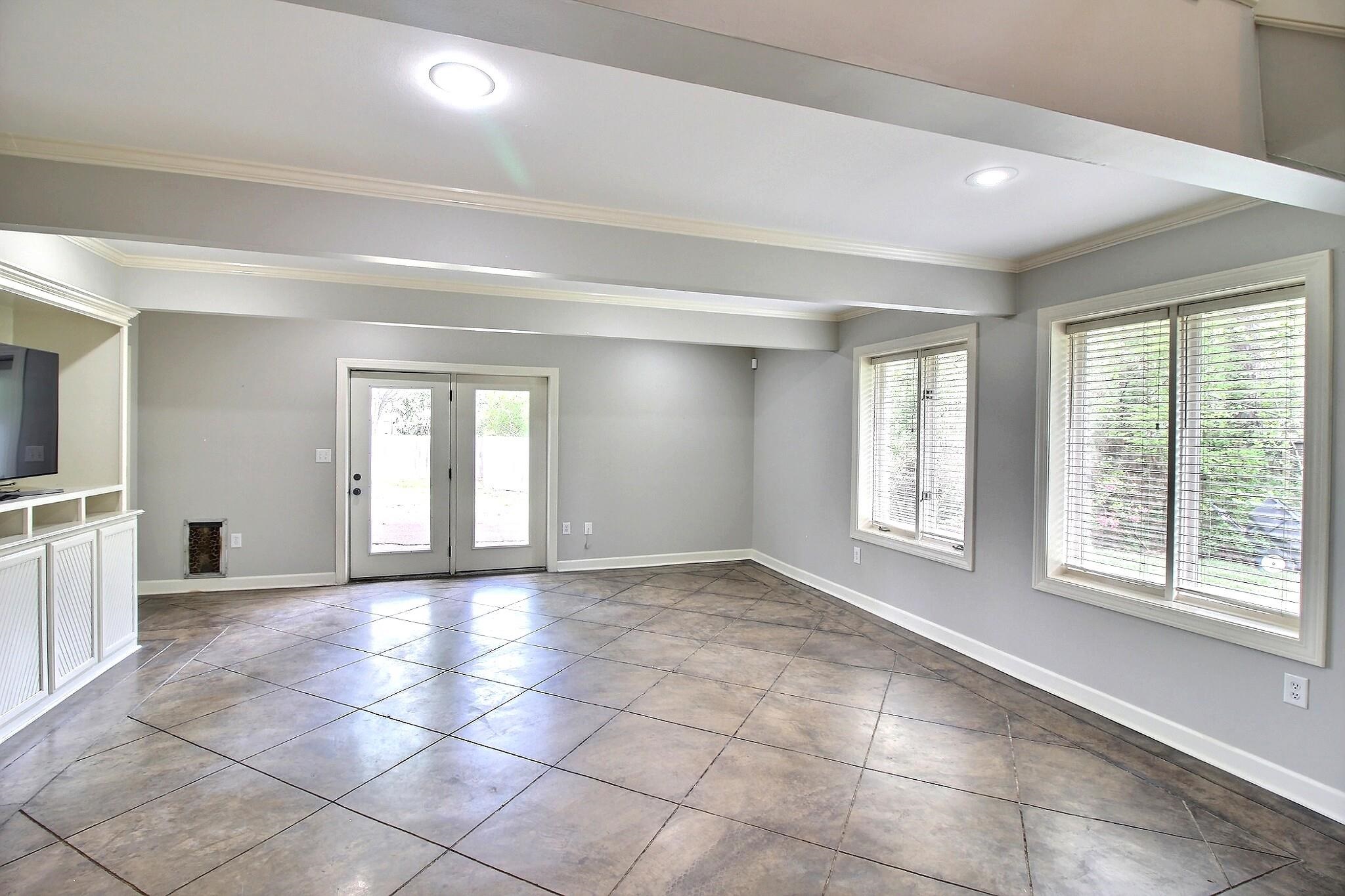 7572 Willey Road Germantown, TN 38138 - Photo 19 of 30 a view of an empty room with a window