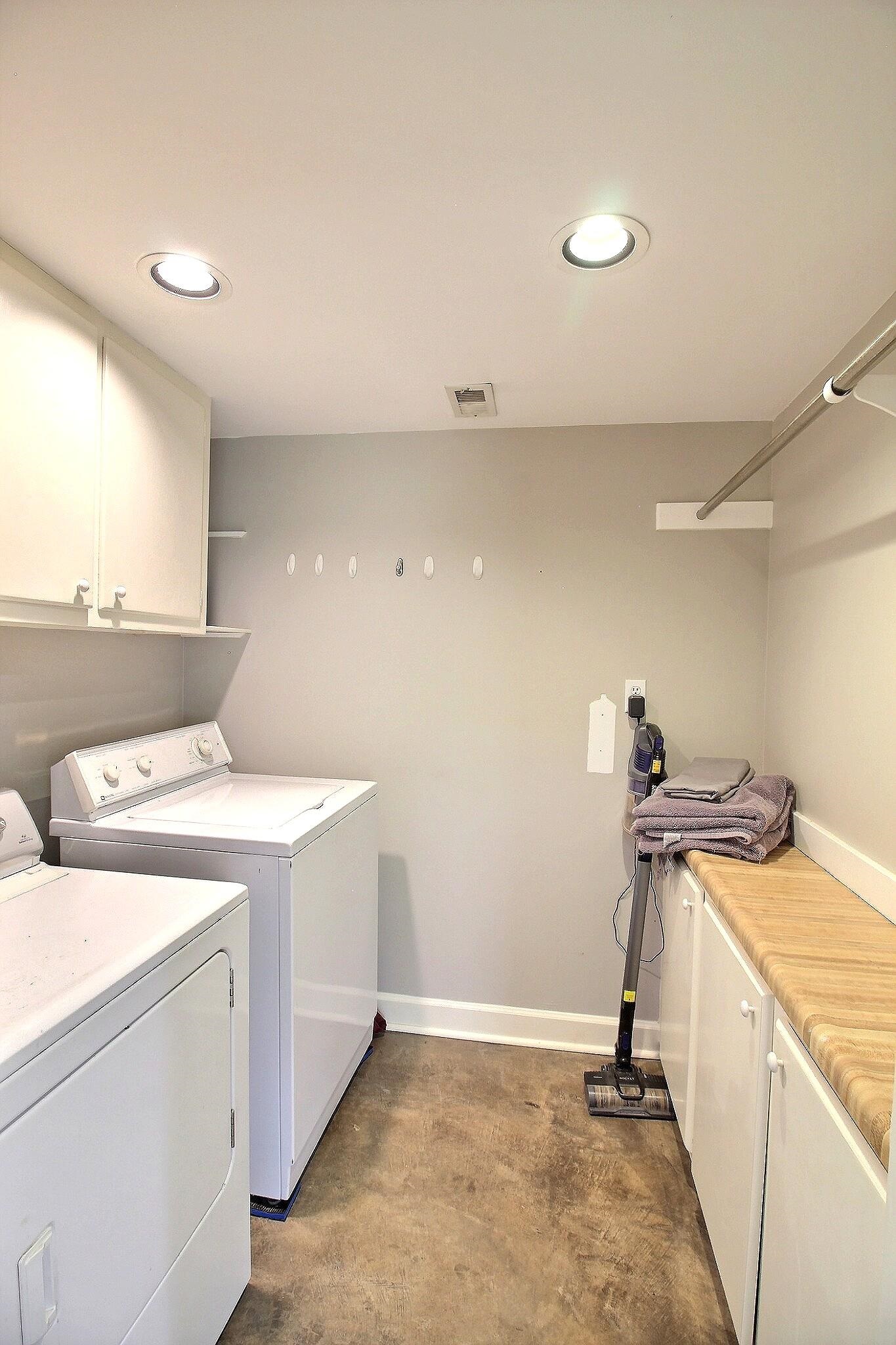 7572 Willey Road Germantown, TN 38138 - Photo 21 of 30 a view of a storage & utility room with two washing machine