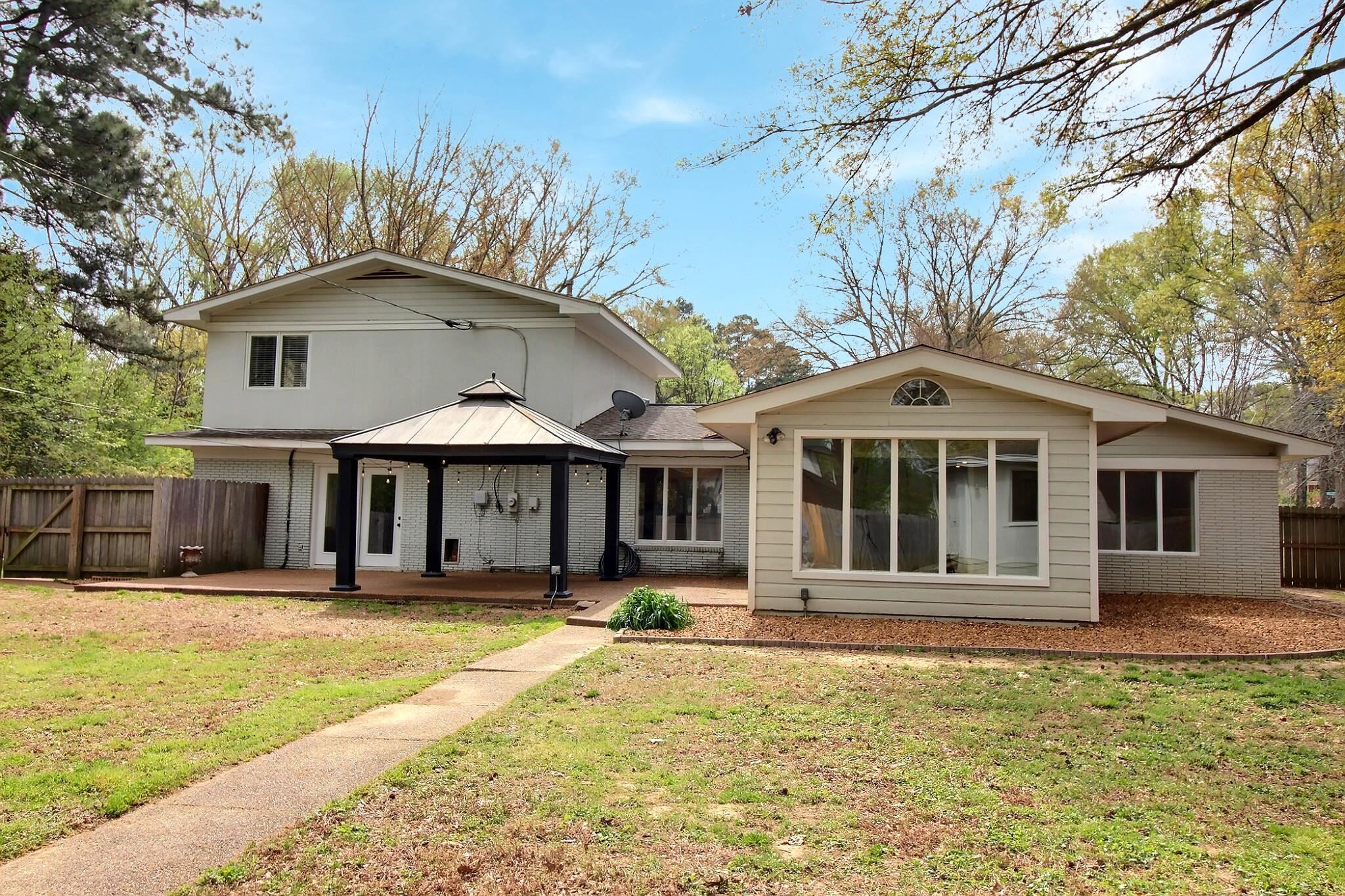 7572 Willey Road Germantown, TN 38138 - Photo 27 of 30 a front view of a house with a yard