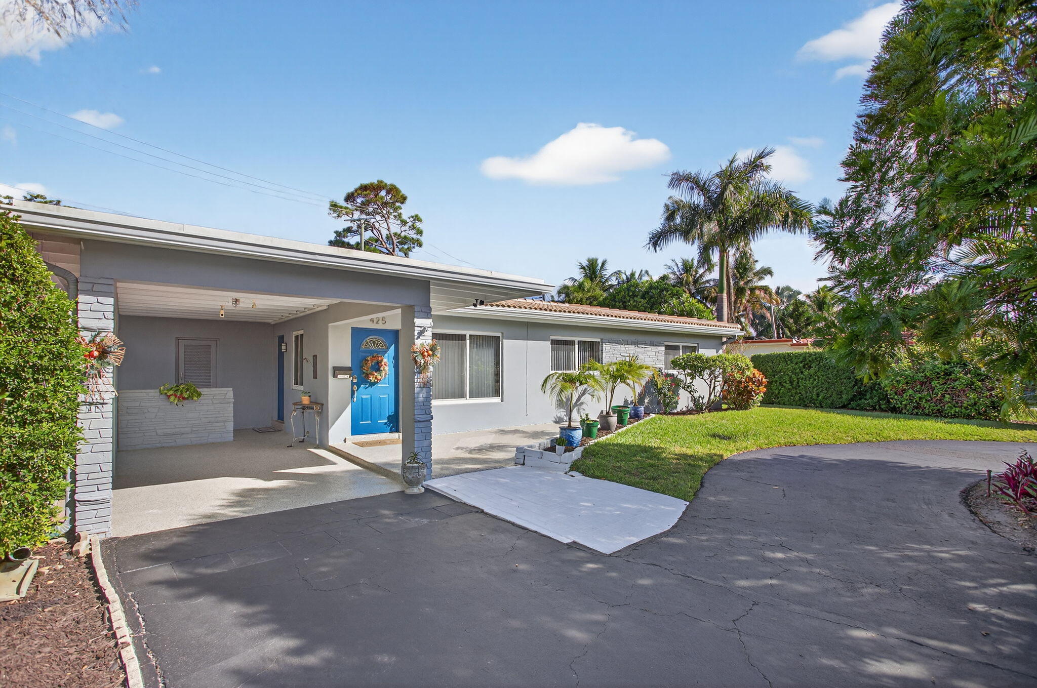 425 Southwest 10th Street Pompano Beach, FL 33060 - Photo 3 of 47 a view of a house with backyard and patio