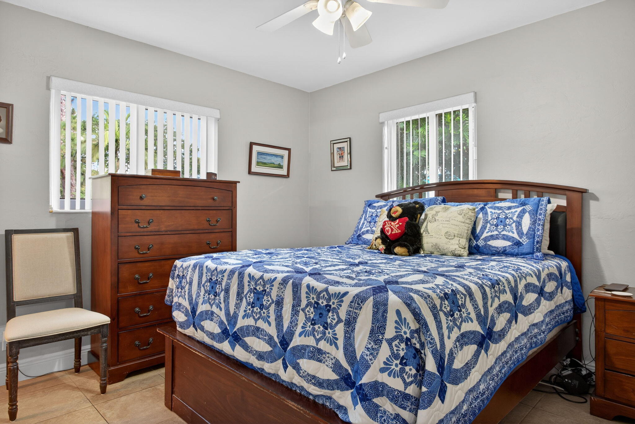 425 Southwest 10th Street Pompano Beach, FL 33060 - Photo 31 of 47 a bedroom with a bed and wooden floor