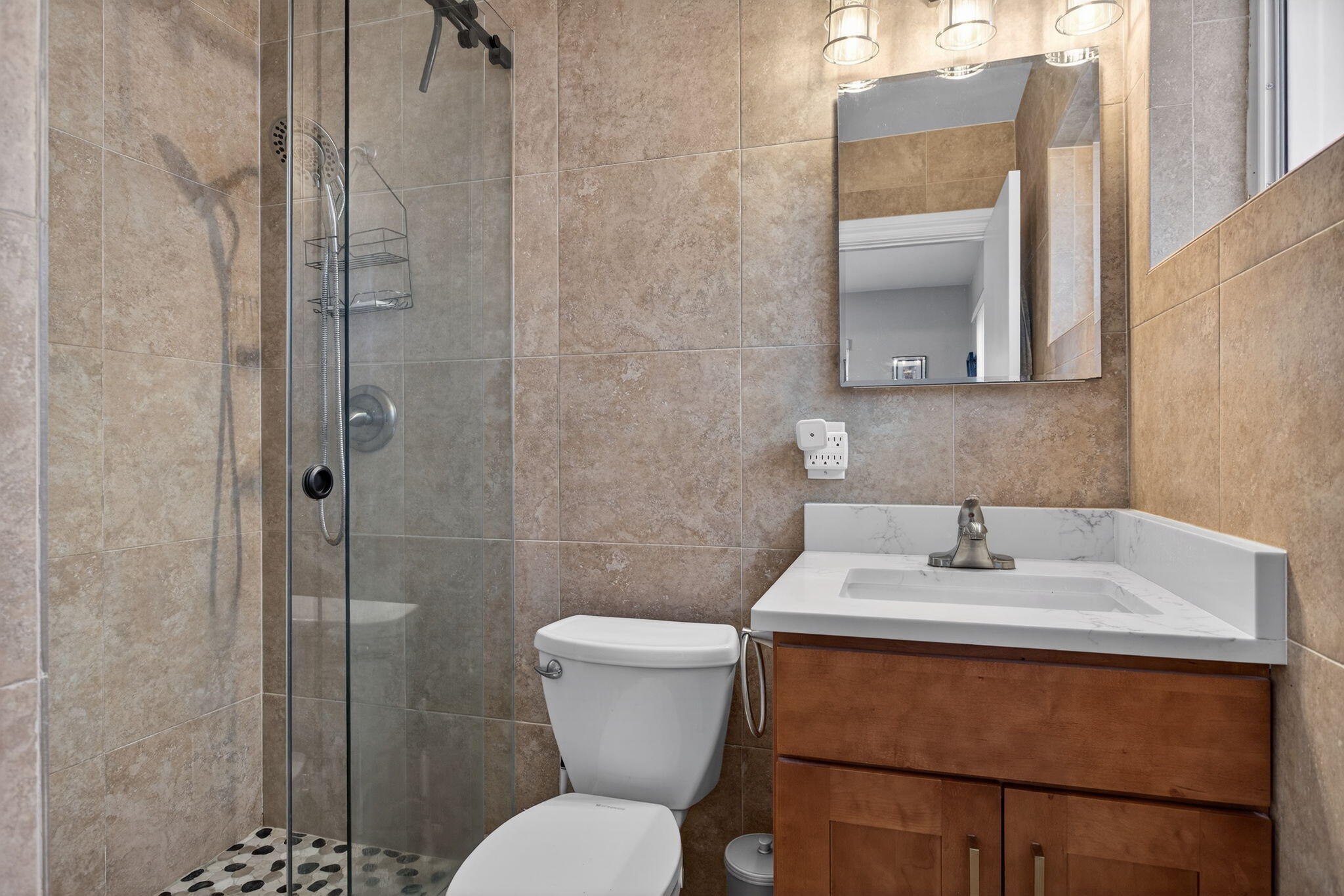 425 Southwest 10th Street Pompano Beach, FL 33060 - Photo 32 of 47 a bathroom with a sink toilet and shower