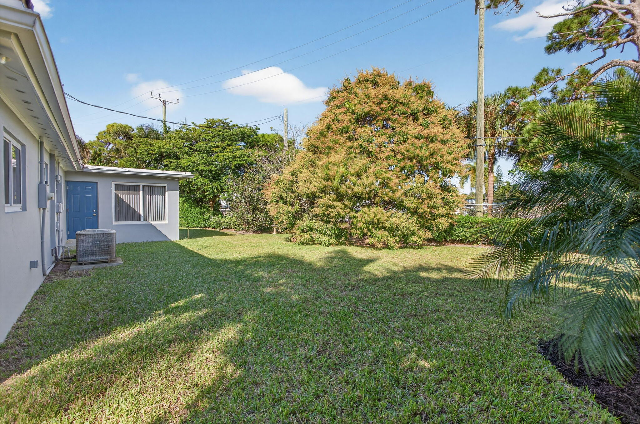 425 Southwest 10th Street Pompano Beach, FL 33060 - Photo 9 of 47 a view of a house with a yard