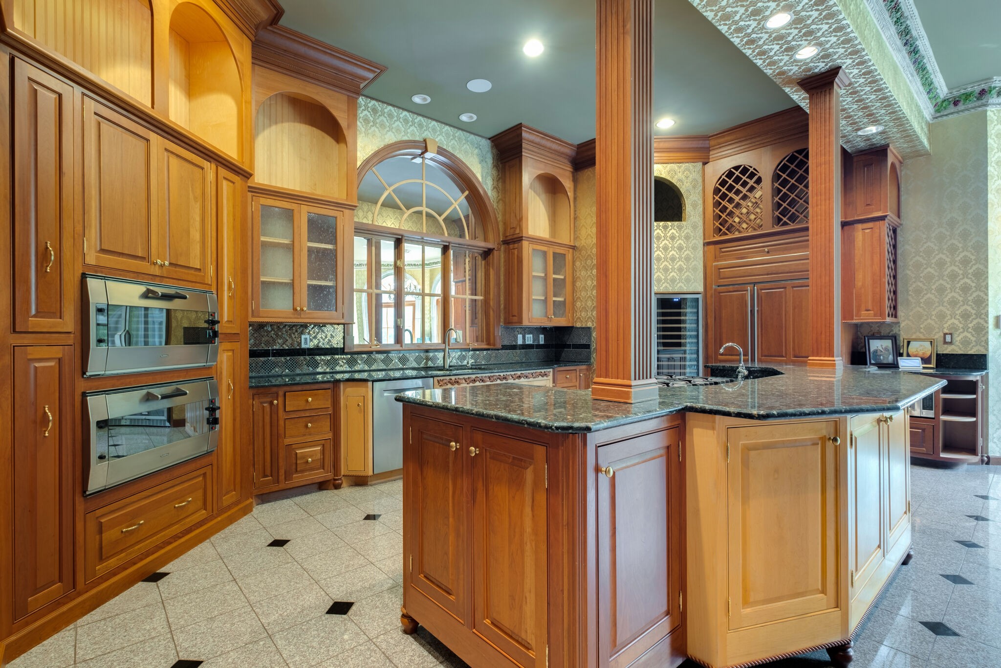 9600 Concord Road Brentwood, TN 37027 - Photo 26 of 99 a kitchen with stainless steel appliances granite countertop a sink and cabinets
