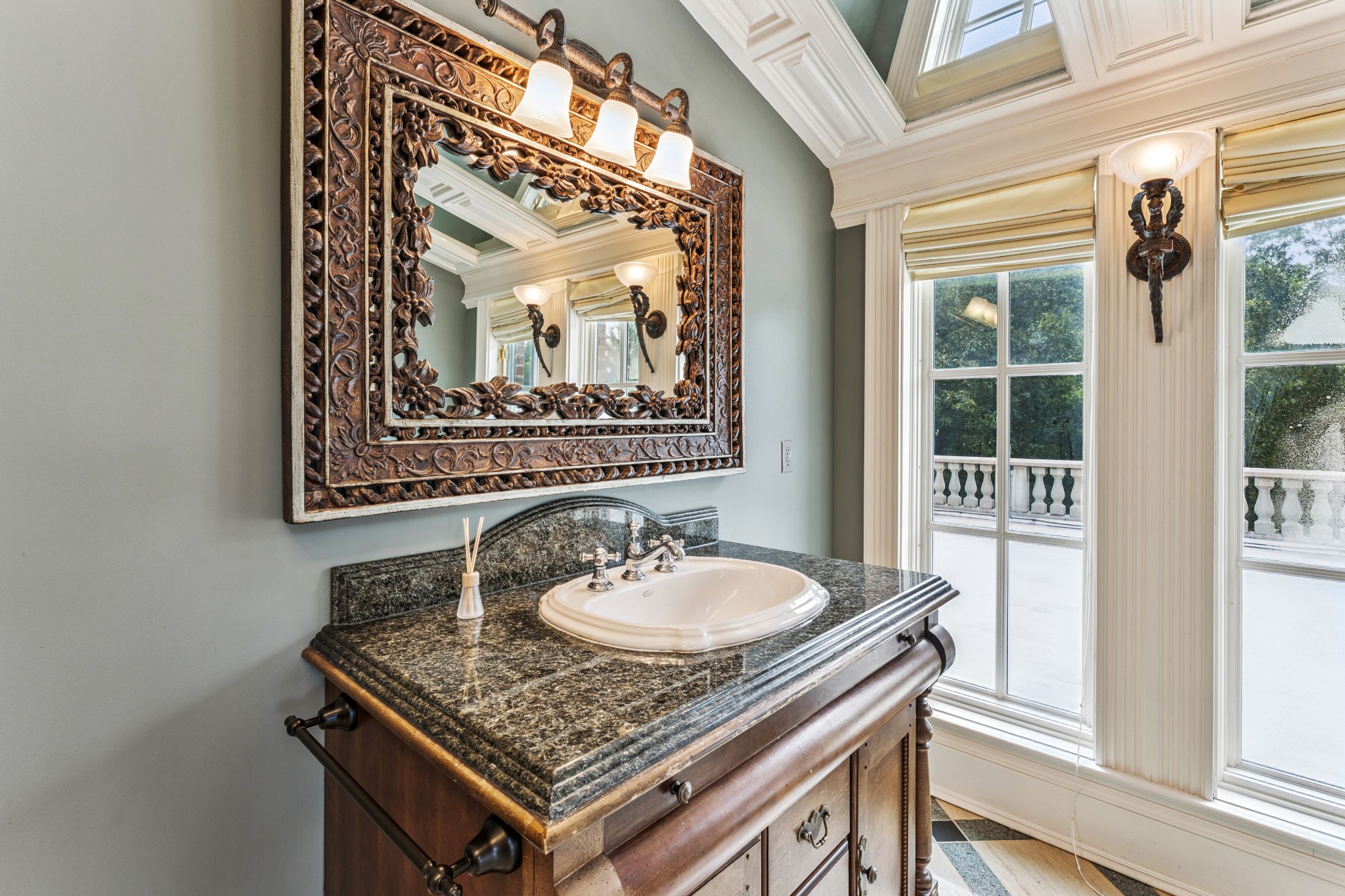 9600 Concord Road Brentwood, TN 37027 - Photo 59 of 99 a bathroom with a sink and a mirror