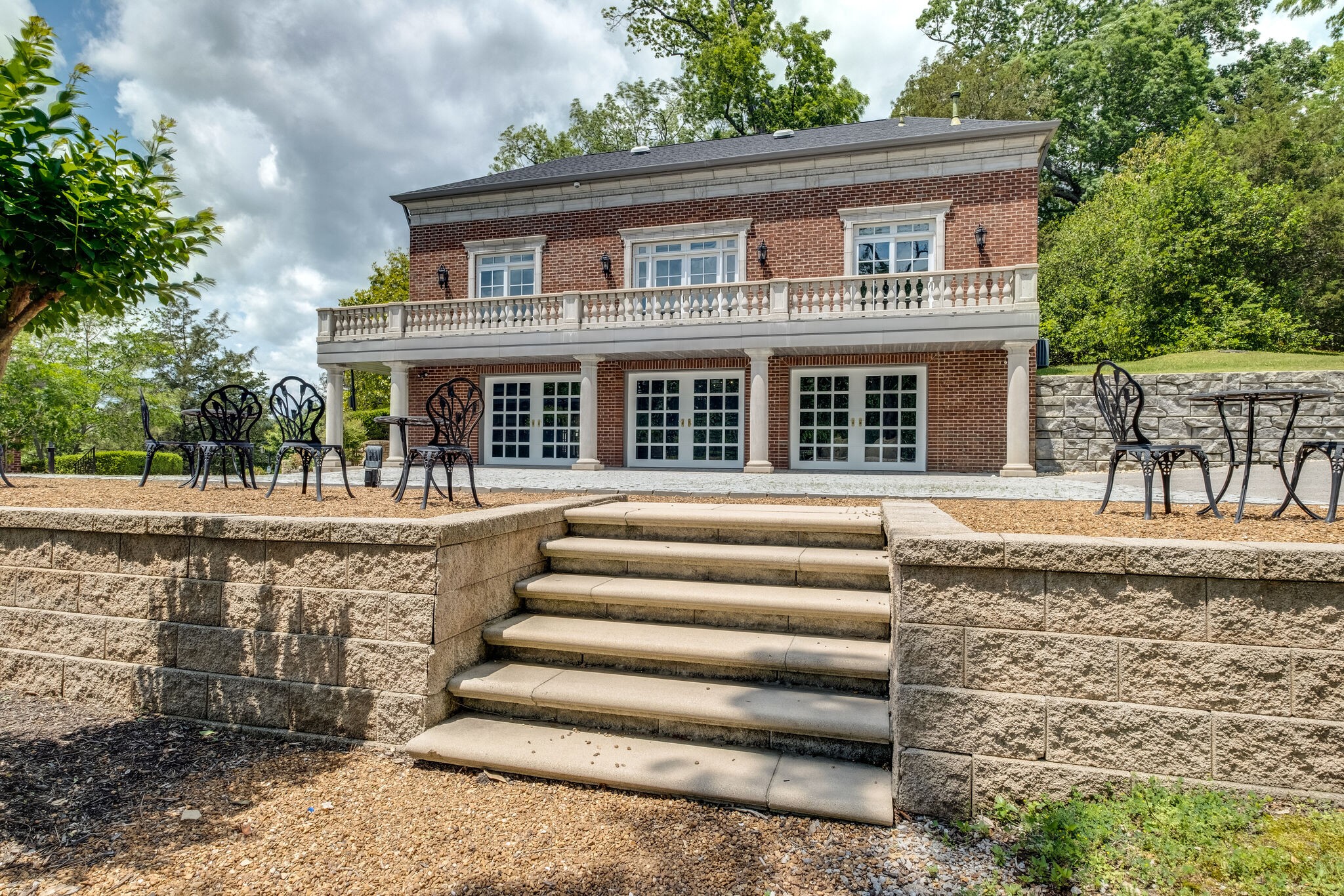 9600 Concord Road Brentwood, TN 37027 - Photo 76 of 99 a front view of a house with a porch