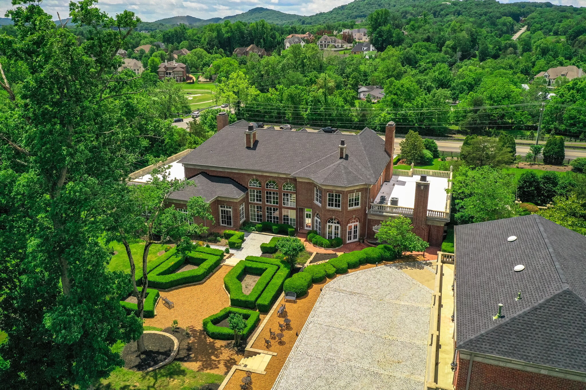 9600 Concord Road Brentwood, TN 37027 - Photo 96 of 99 an aerial view of a house with a garden and plants