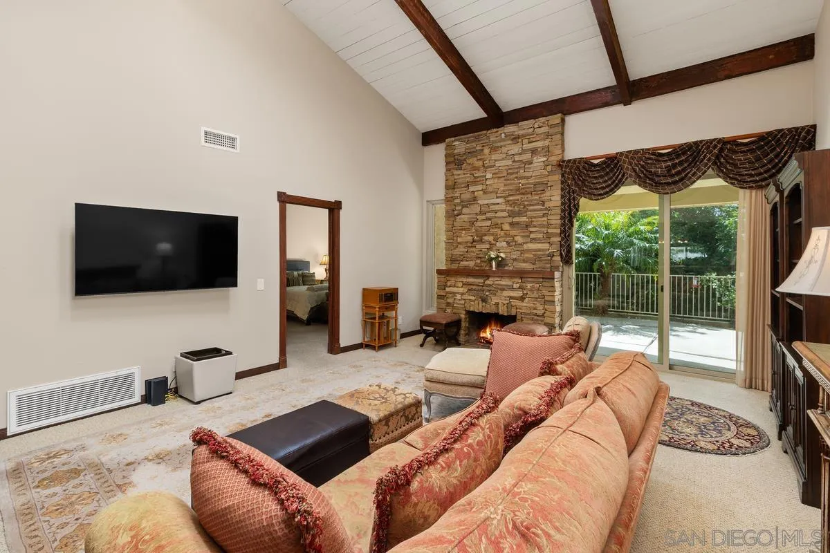 17442 Port Marnock Drive Poway, CA 92064 - Photo 12 of 28 a living room with furniture tv and a flat screen tv