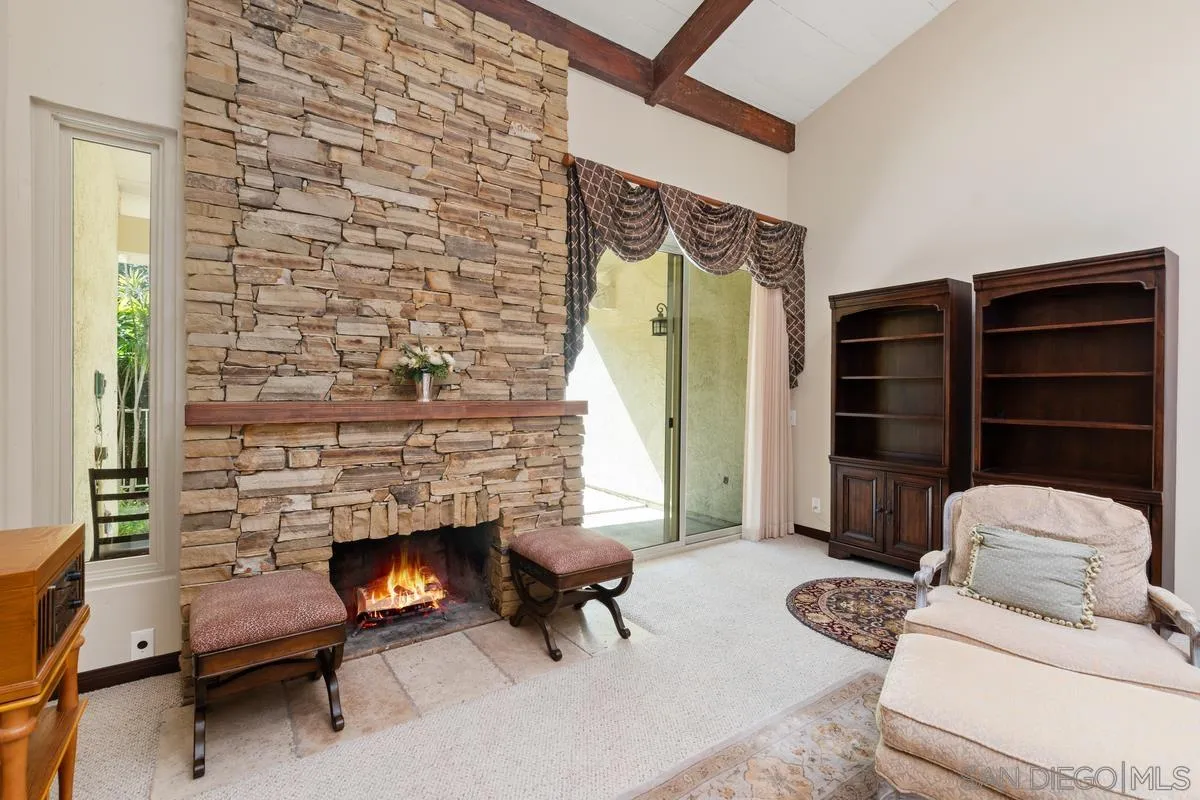 17442 Port Marnock Drive Poway, CA 92064 - Photo 14 of 28 a living room with furniture and a fireplace