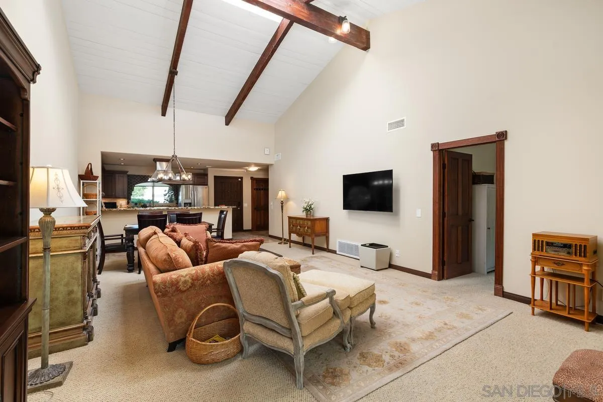 17442 Port Marnock Drive Poway, CA 92064 - Photo 16 of 28 a living room with furniture and a flat screen tv