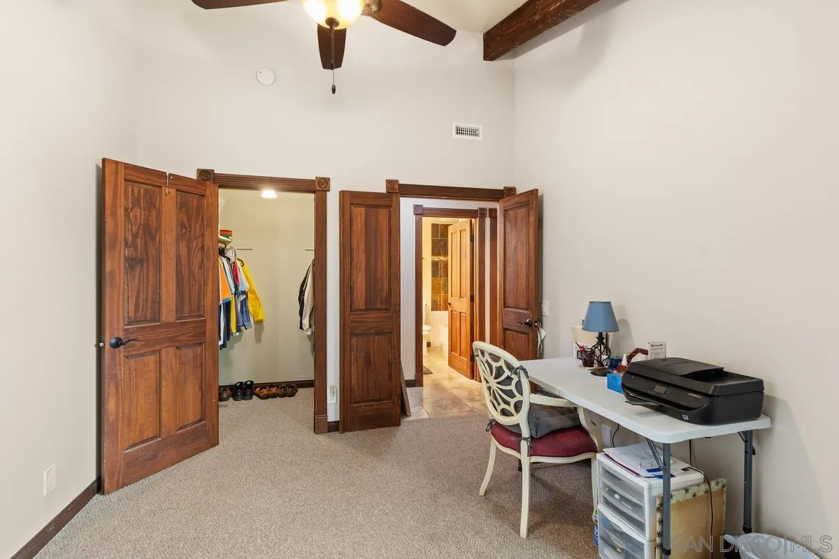 17442 Port Marnock Drive Poway, CA 92064 - Photo 21 of 28 a dining room with furniture and a chandelier
