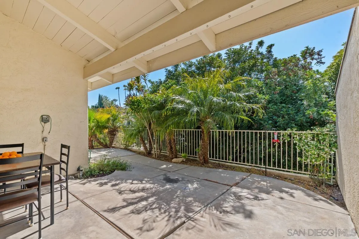 17442 Port Marnock Drive Poway, CA 92064 - Photo 24 of 28 a view of a chair and table in the backyard