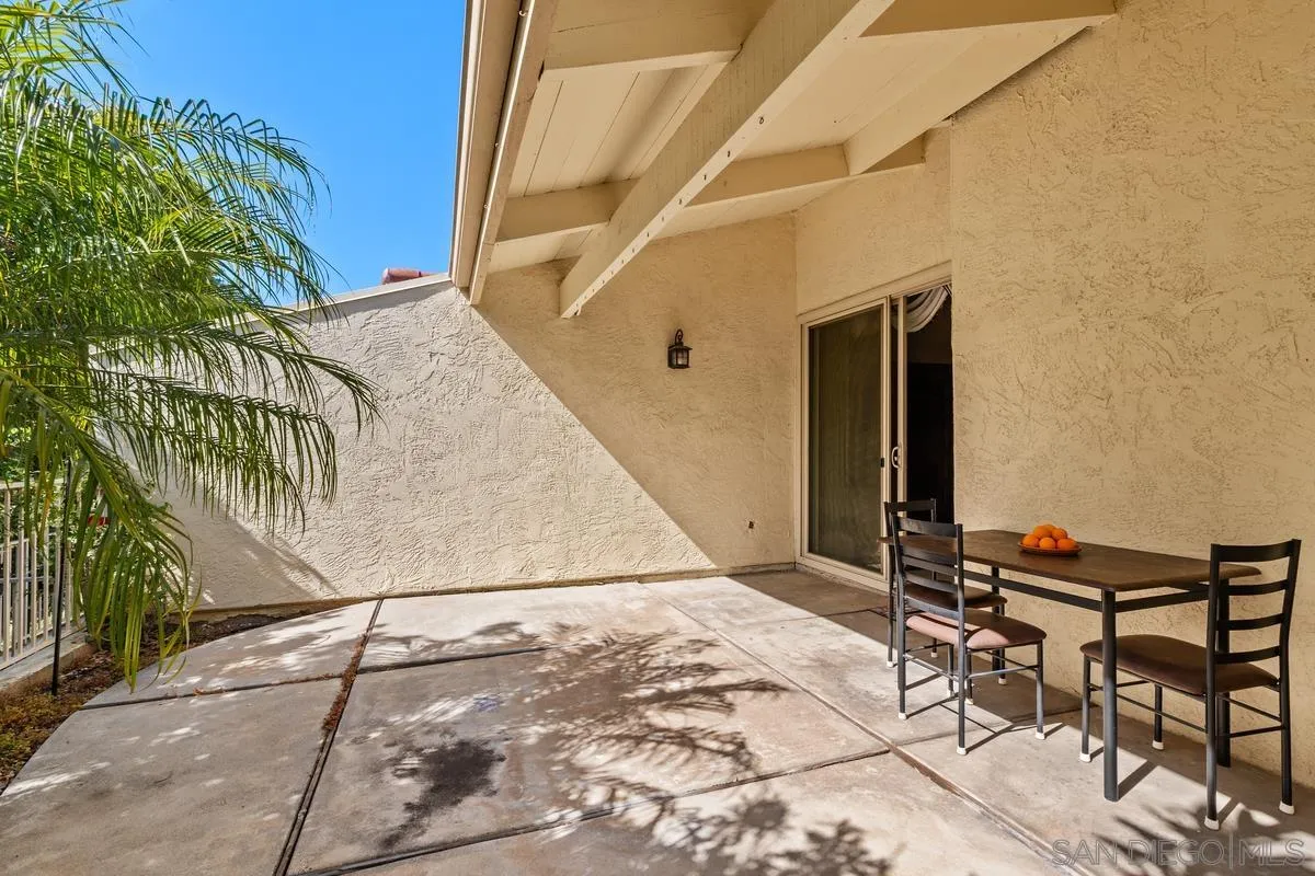 17442 Port Marnock Drive Poway, CA 92064 - Photo 26 of 28 a backyard of a house with table and chairs