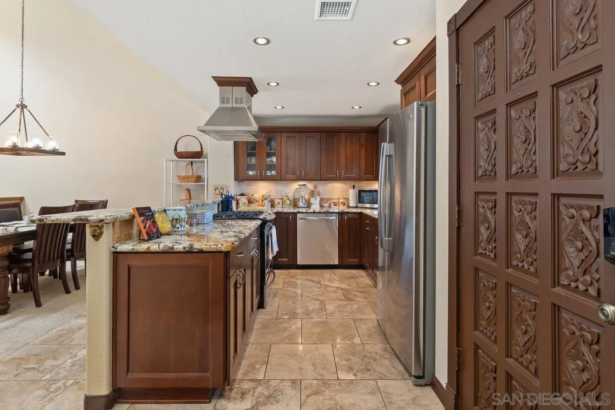 17442 Port Marnock Drive Poway, CA 92064 - Photo 5 of 28 a kitchen with lots of counter top space