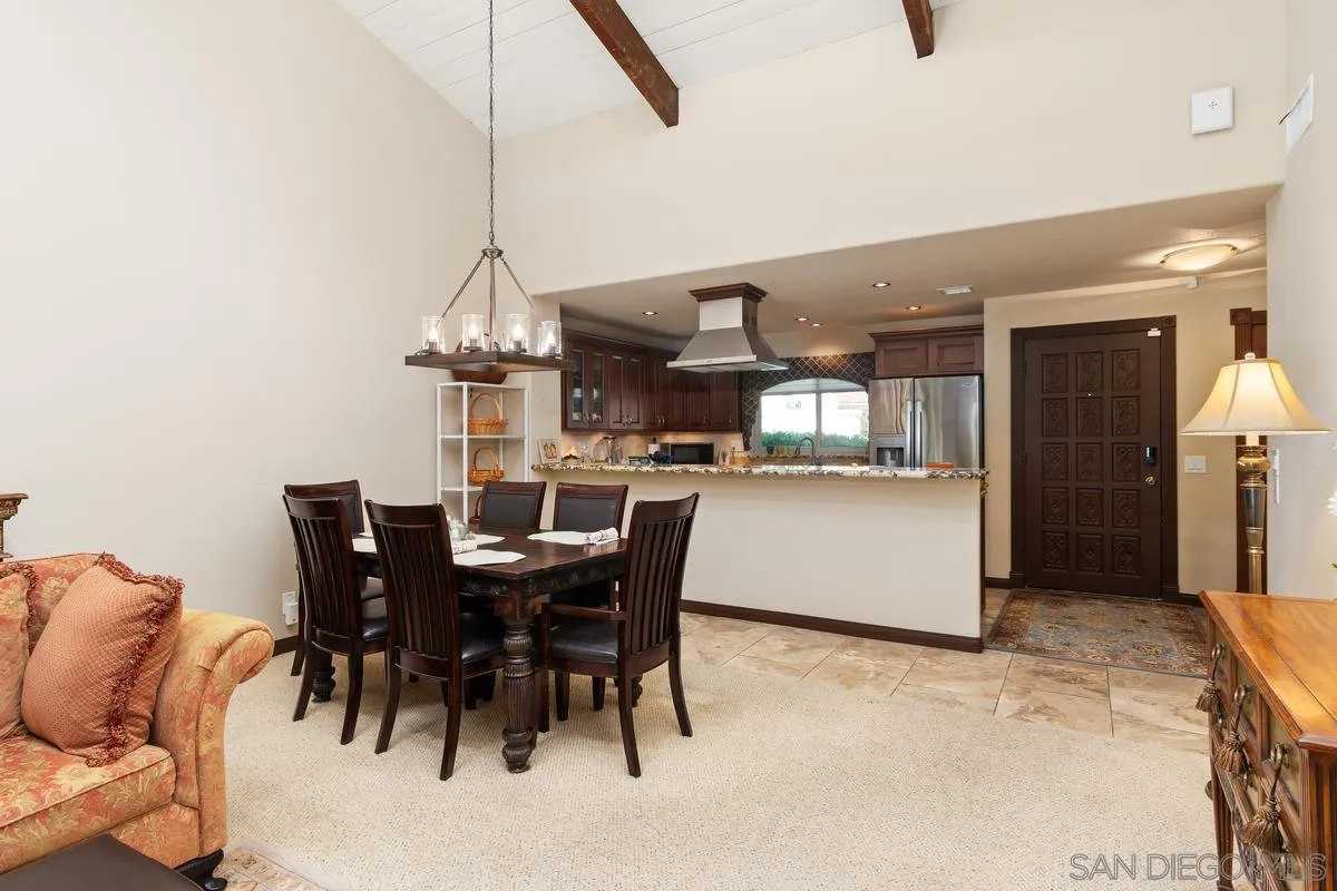 17442 Port Marnock Drive Poway, CA 92064 - Photo 9 of 28 a dining room with furniture and window
