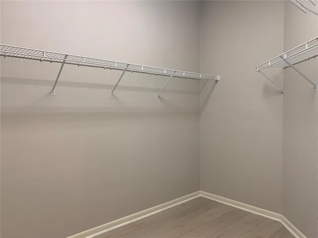 a view of a room with racks on the wall