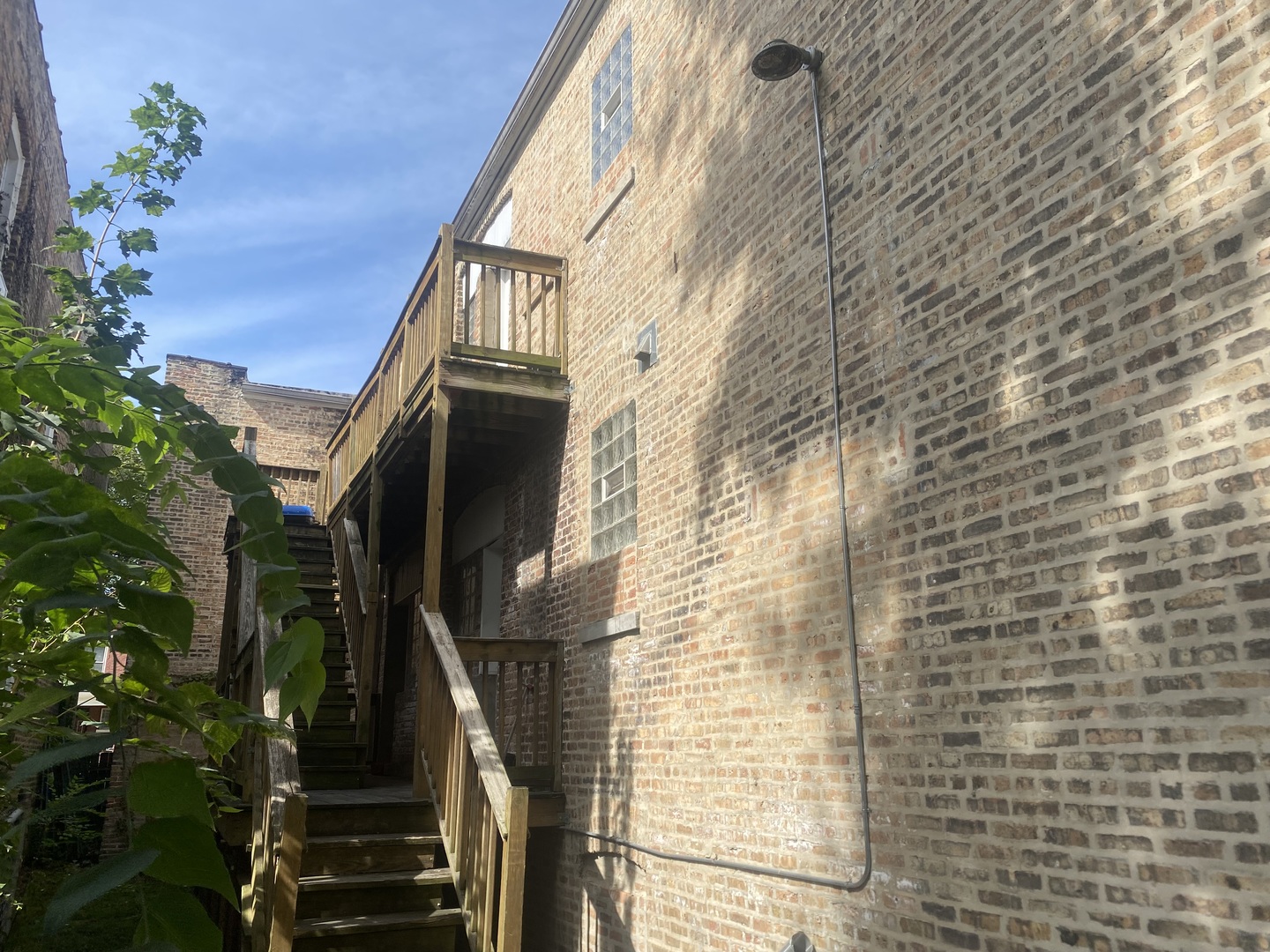 1253 West 80th Street, Unit 2E Chicago, IL 60620 - Photo 2 of 10 a view of a pathway along the building