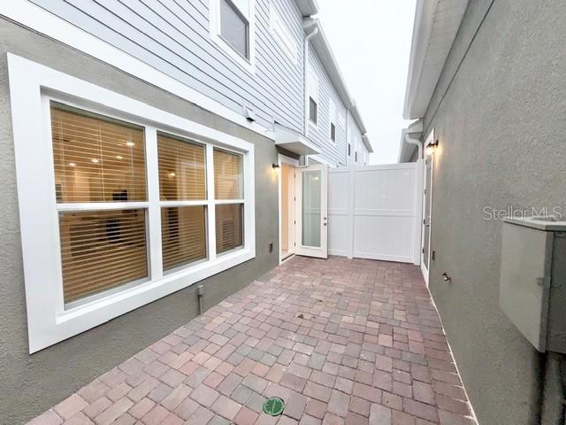 1463 Alston Bay Boulevard Apopka, FL 32703 - Photo 18 of 19 a view of empty room with a large window