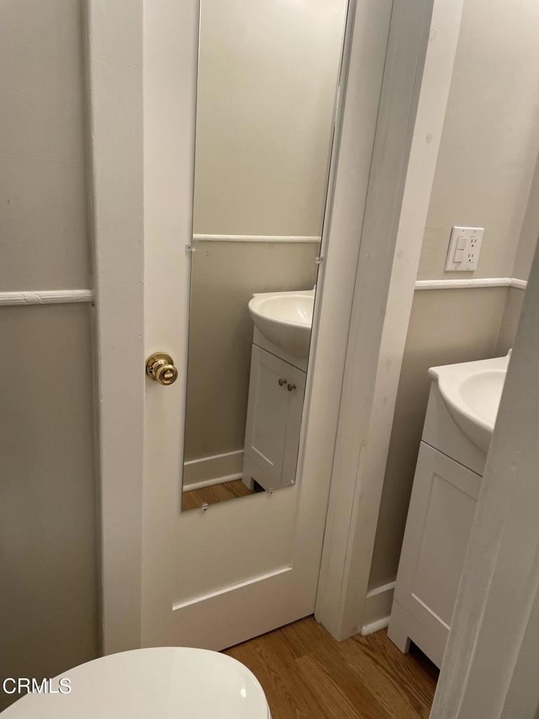 1827 East Woodbury Road Pasadena, CA 91104 - Photo 7 of 11 a bathroom with a sink and toilet