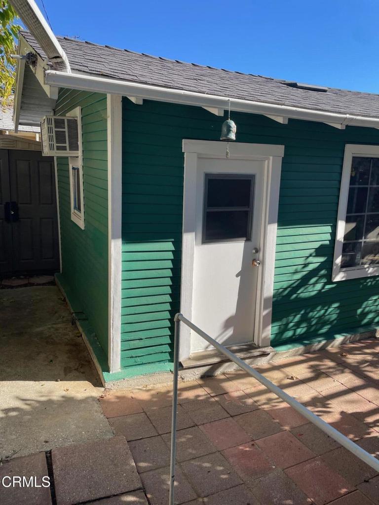 1827 East Woodbury Road Pasadena, CA 91104 - Photo 10 of 11 a front view of a house with a garage