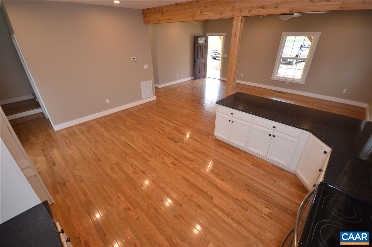 2501 Dunnes Shop Road Ruckersville, VA 22968 - Photo 11 of 46 a view of hallway with window and wooden floor