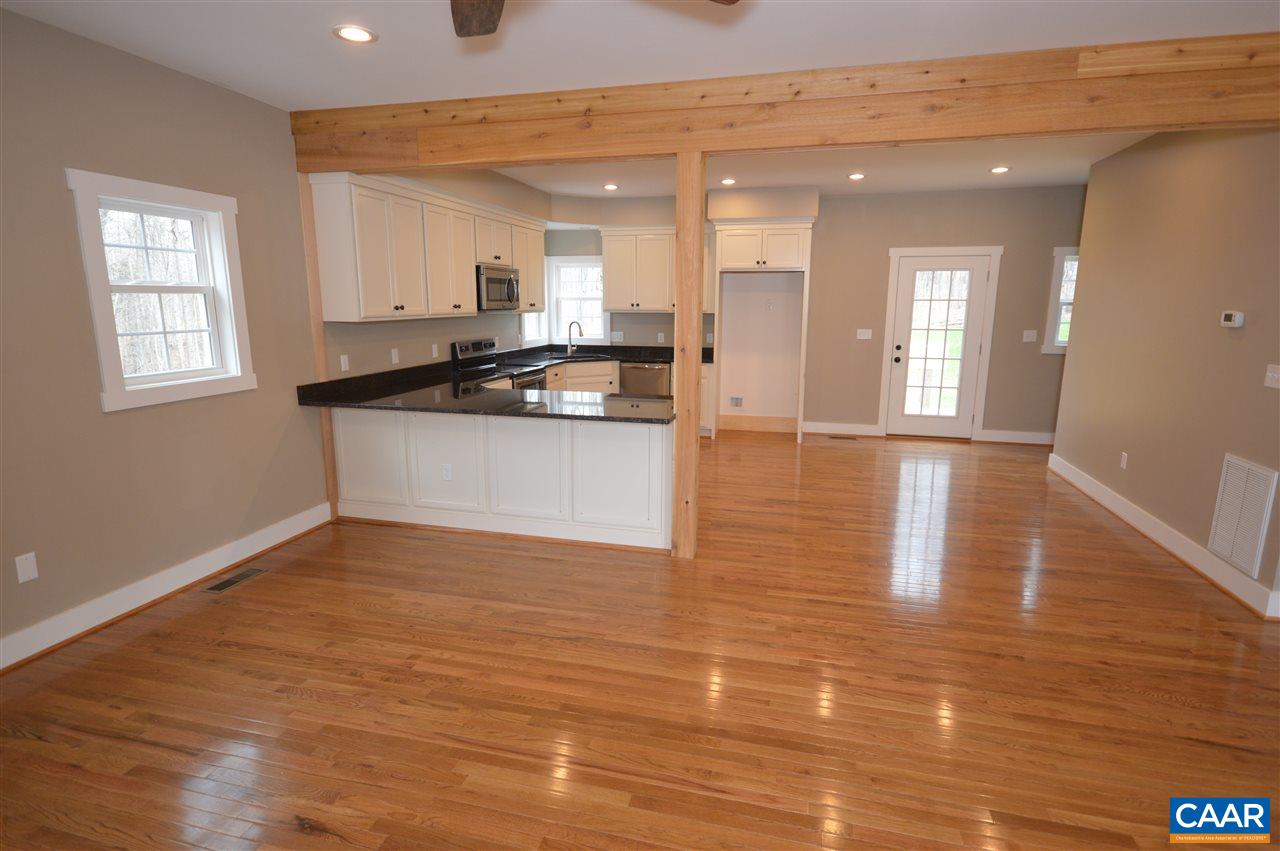 2501 Dunnes Shop Road Ruckersville, VA 22968 - Photo 14 of 46 a view of kitchen and hall with wooden floor