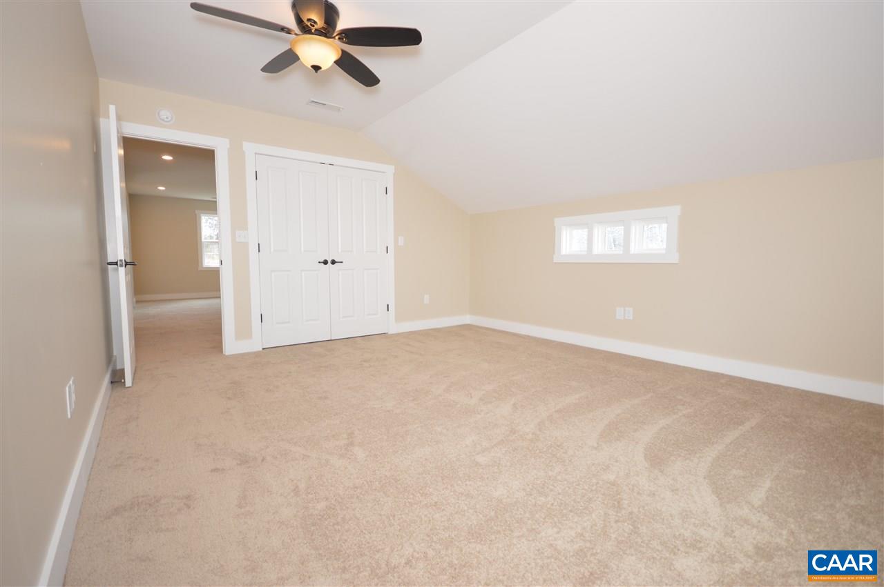 2501 Dunnes Shop Road Ruckersville, VA 22968 - Photo 24 of 46 an empty room with closet and windows