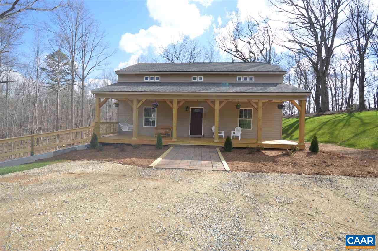 2501 Dunnes Shop Road Ruckersville, VA 22968 - Photo 36 of 46 a front view of a house with a yard and garage