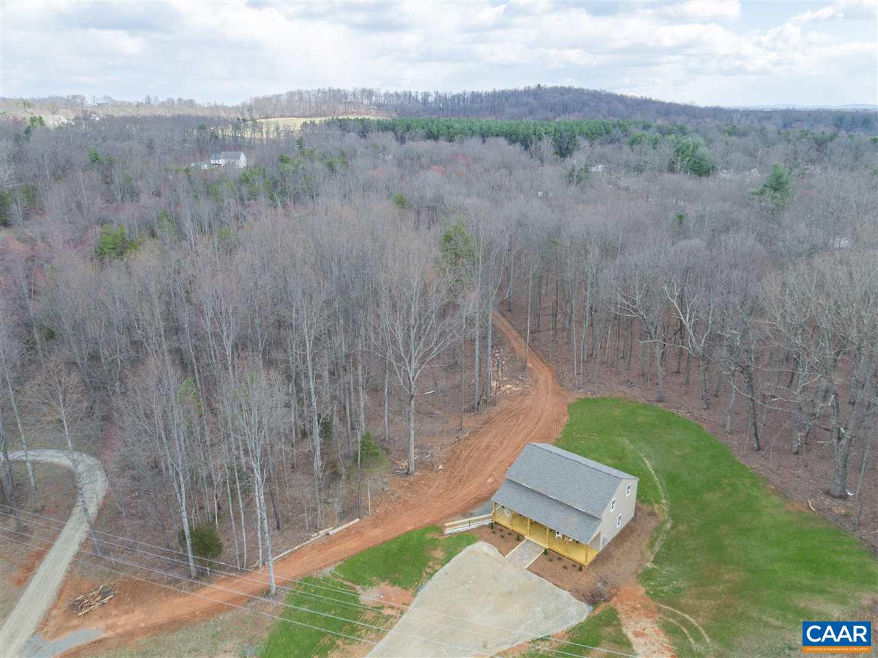 2501 Dunnes Shop Road Ruckersville, VA 22968 - Photo 41 of 46 a view of a lake with a yard