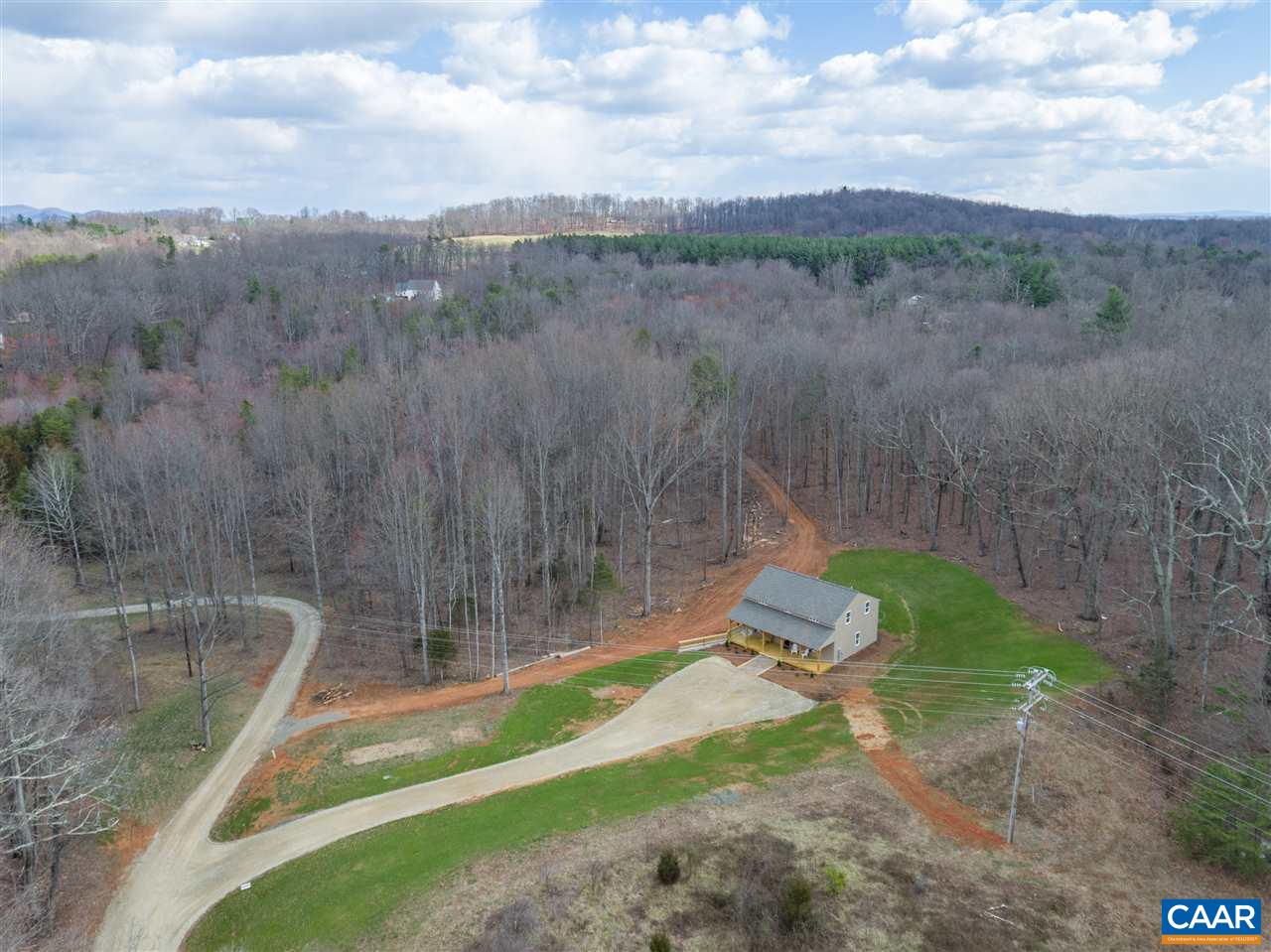 2501 Dunnes Shop Road Ruckersville, VA 22968 - Photo 42 of 46 a backyard of a house with lots of green space