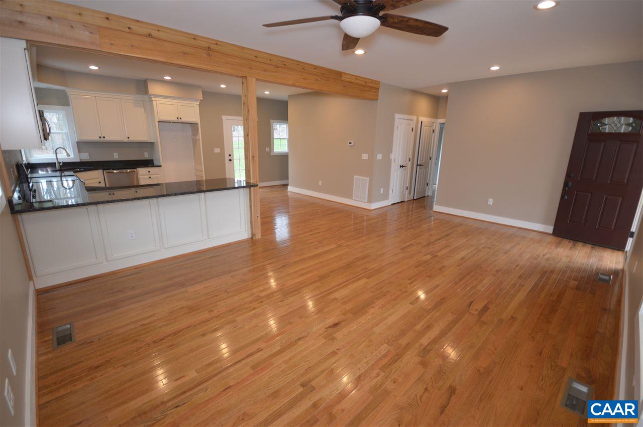 2501 Dunnes Shop Road Ruckersville, VA 22968 - Photo 10 of 46 a view of a kitchen with a sink and a refrigerator