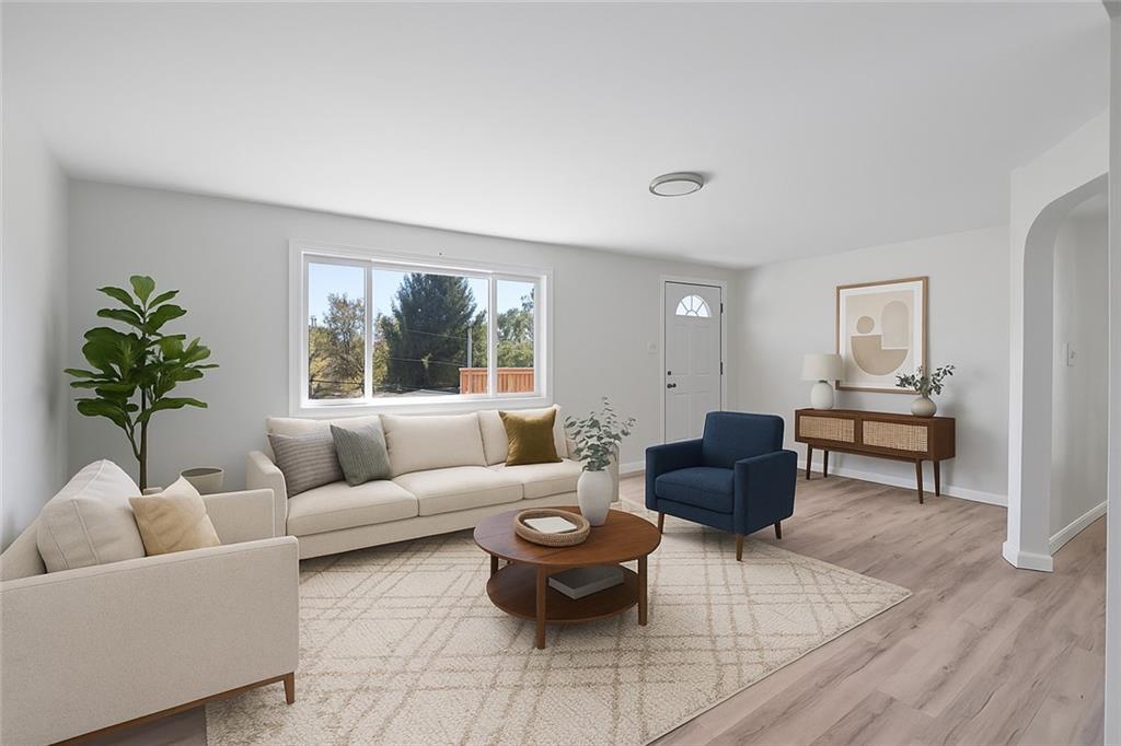 1460 Guffey Road Irwin, PA 15642 - Photo 2 of 33 a living room with furniture and a large window