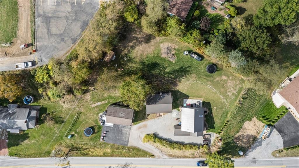 1460 Guffey Road Irwin, PA 15642 - Photo 28 of 33 an aerial view of a house with a yard