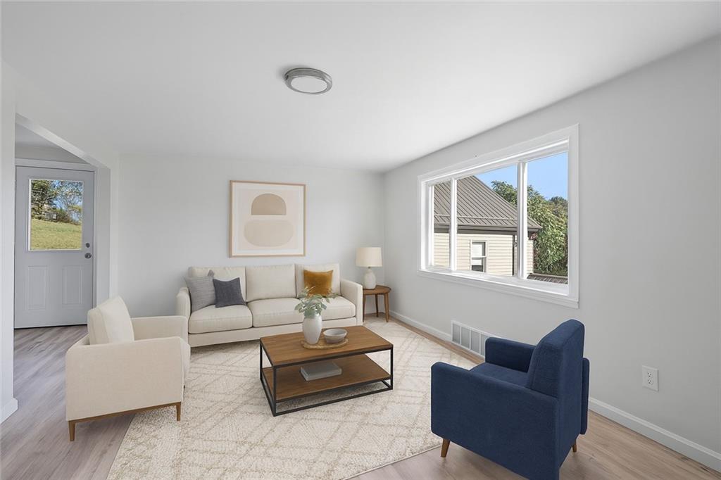 1460 Guffey Road Irwin, PA 15642 - Photo 3 of 33 a living room with furniture and a window