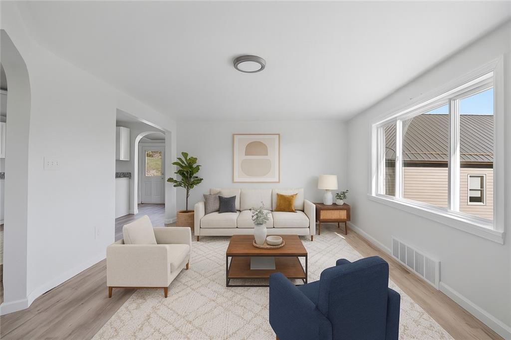 1460 Guffey Road Irwin, PA 15642 - Photo 4 of 33 a living room with furniture and a window