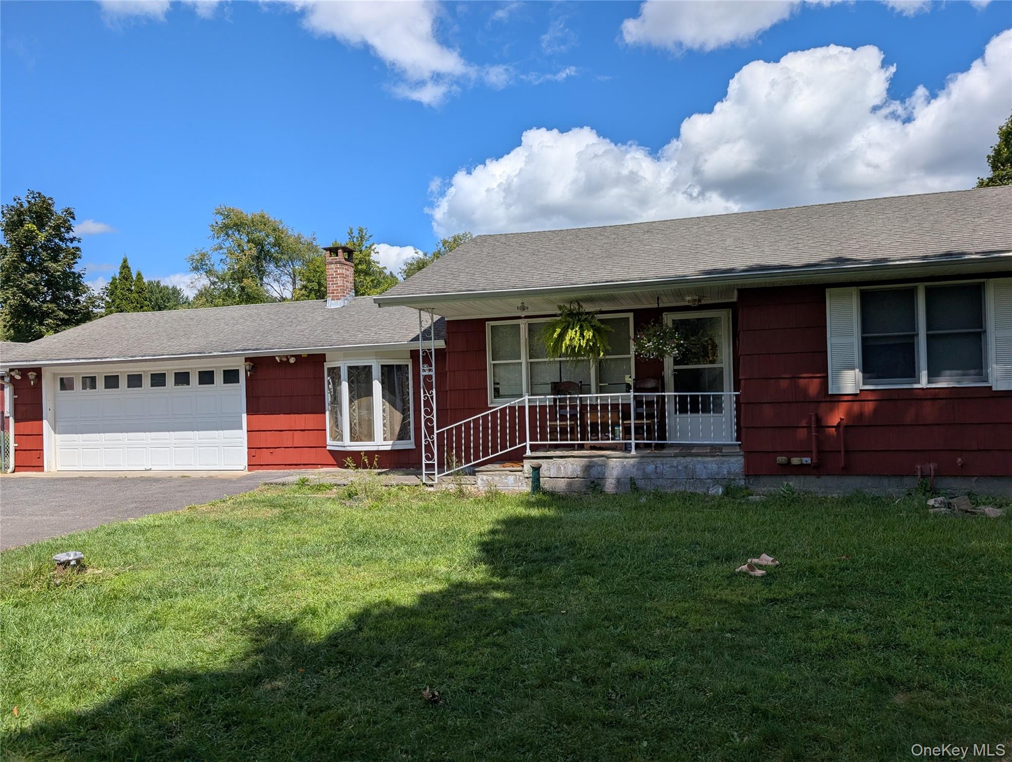66-333 County Rte 27 Copake, NY 12516 - Photo 3 of 3 a front view of a house with a garden
