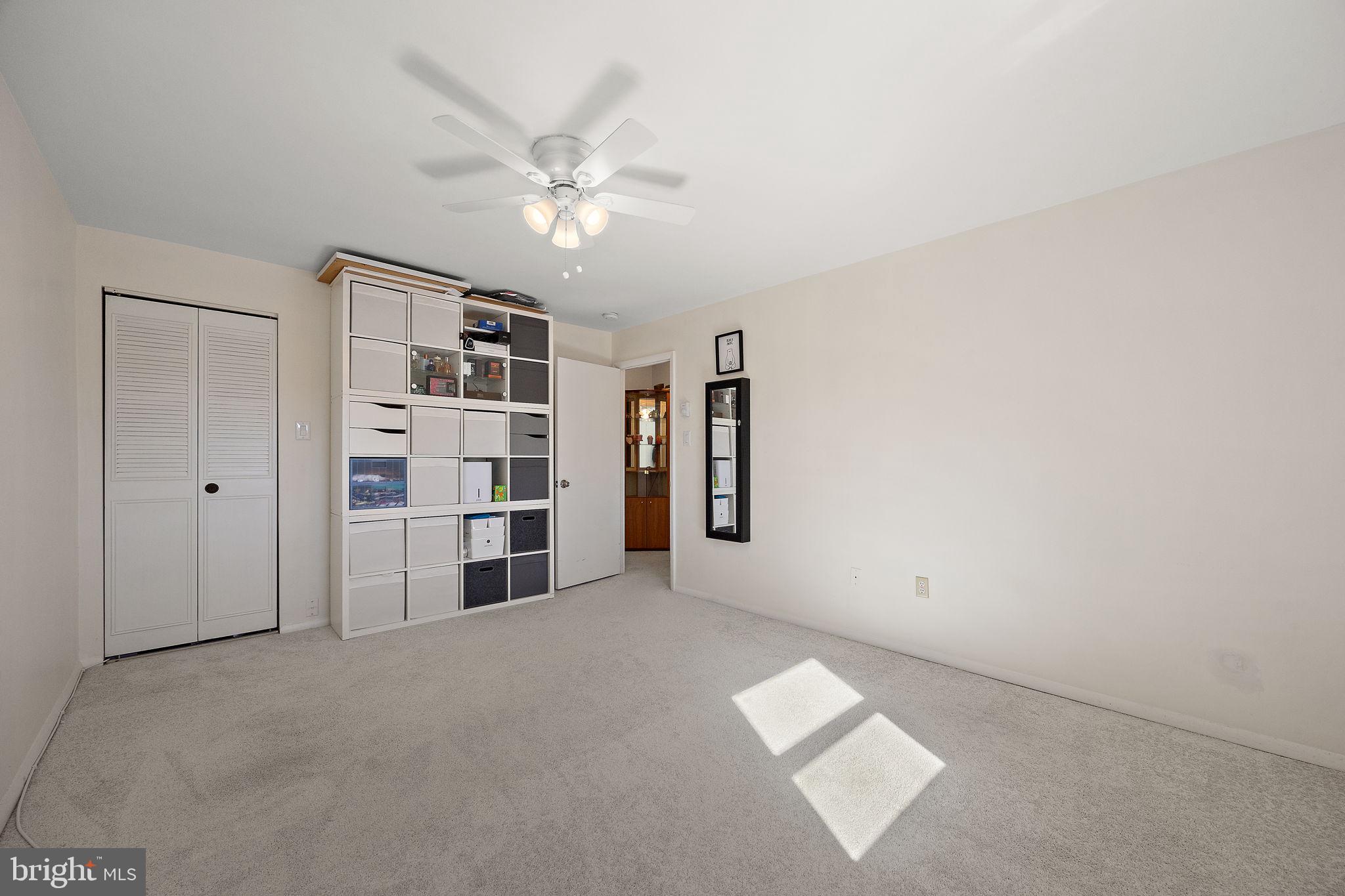 117 Railroad Avenue, Unit A7 West Grove, PA 19390 - Photo 21 of 27 a view of an empty room with a window