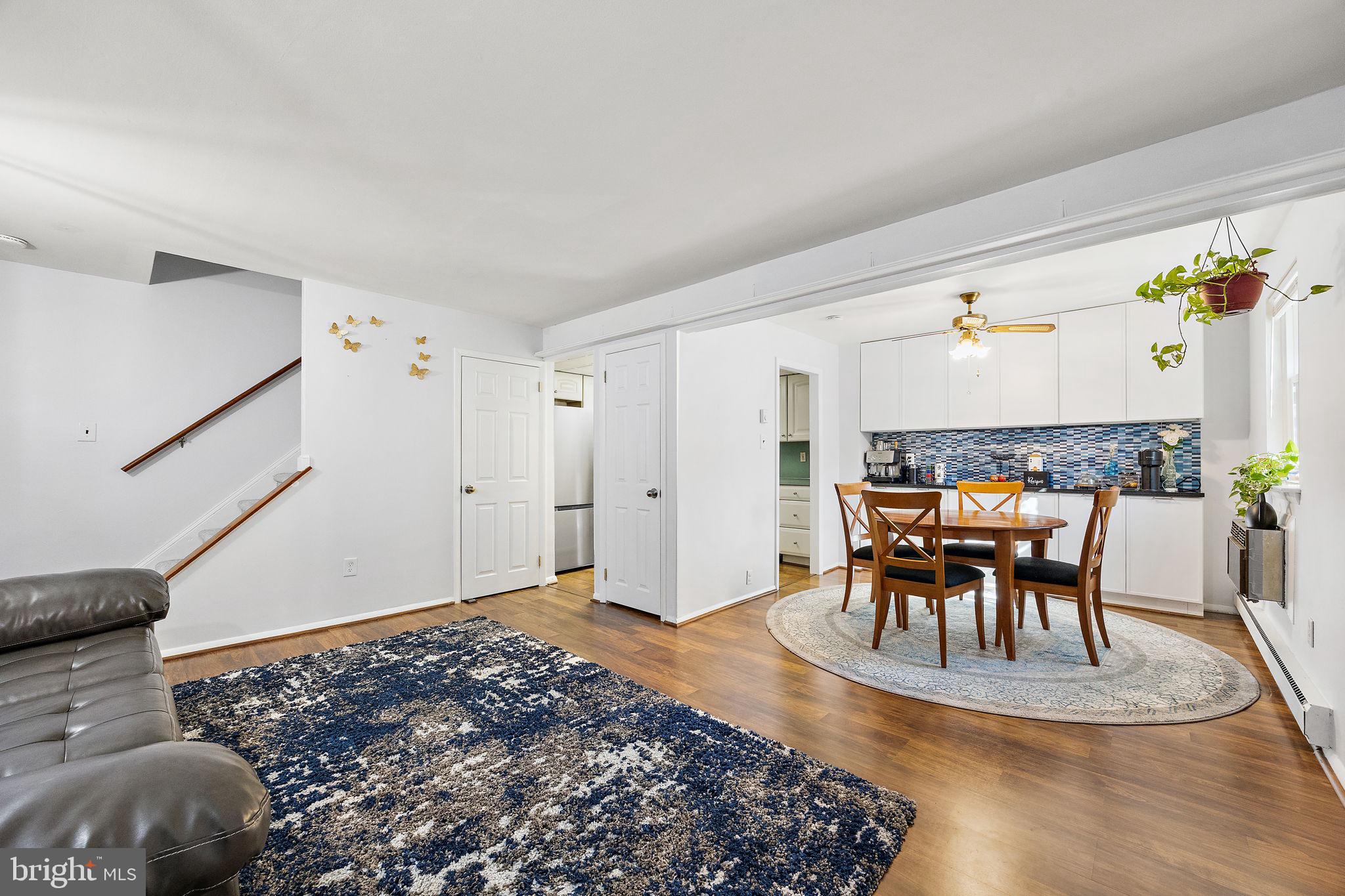 117 Railroad Avenue, Unit A7 West Grove, PA 19390 - Photo 4 of 27 a living room with furniture and wooden floor