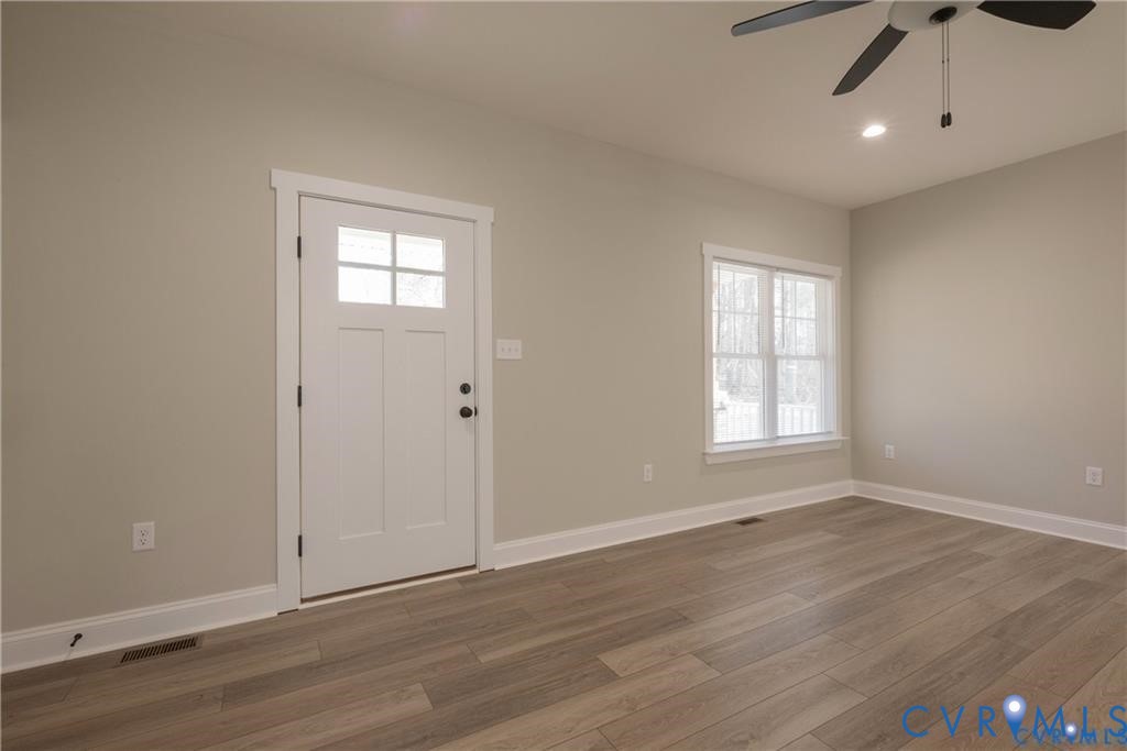 2223 Ridge Road Arvonia, VA 23004 - Photo 28 of 32 Bright living space featuring wood-finish flooring