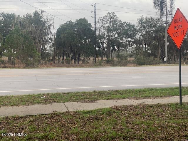 197 Meridian Road Beaufort, SC 29907 - Photo 1 of 6 View of Hwy 802 from the lot