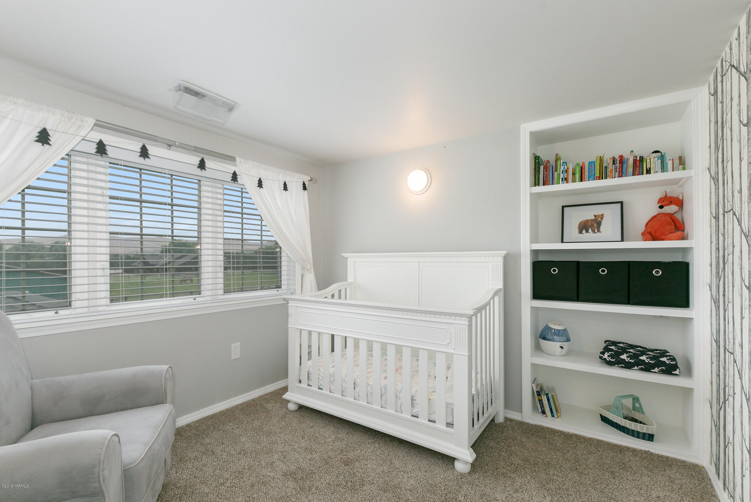 3551 Birchfield Road Moxee, WA 98936 - Photo 22 of 24 a bedroom with furniture and baby crib