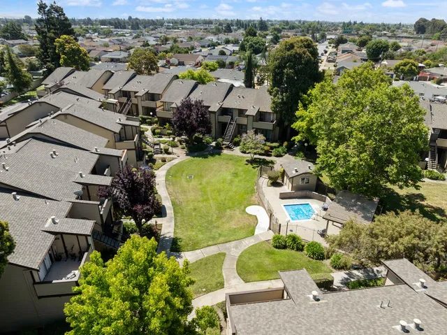 an aerial view of residential house with outdoor space