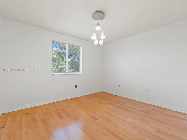 a view of a living room and entryway