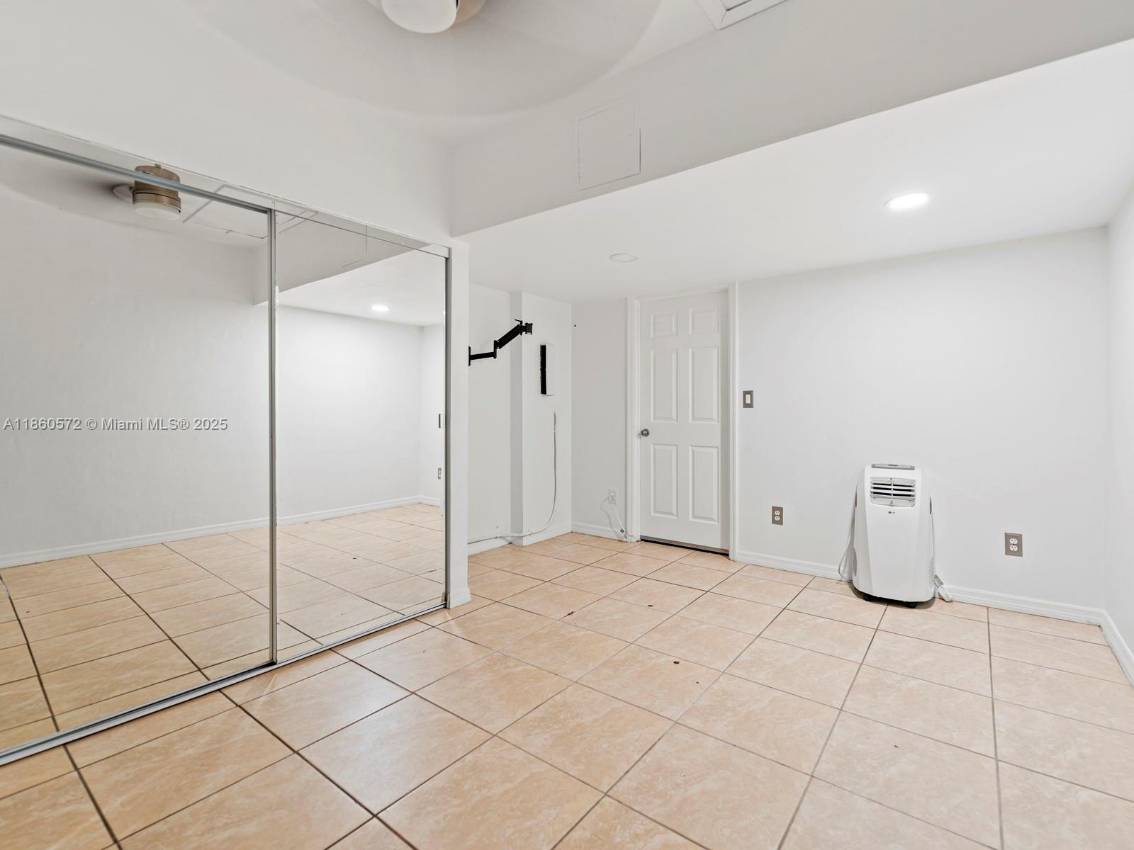 16544 Southwest 68th Terrace Miami, FL 33193 - Photo 23 of 32 a view of an empty room