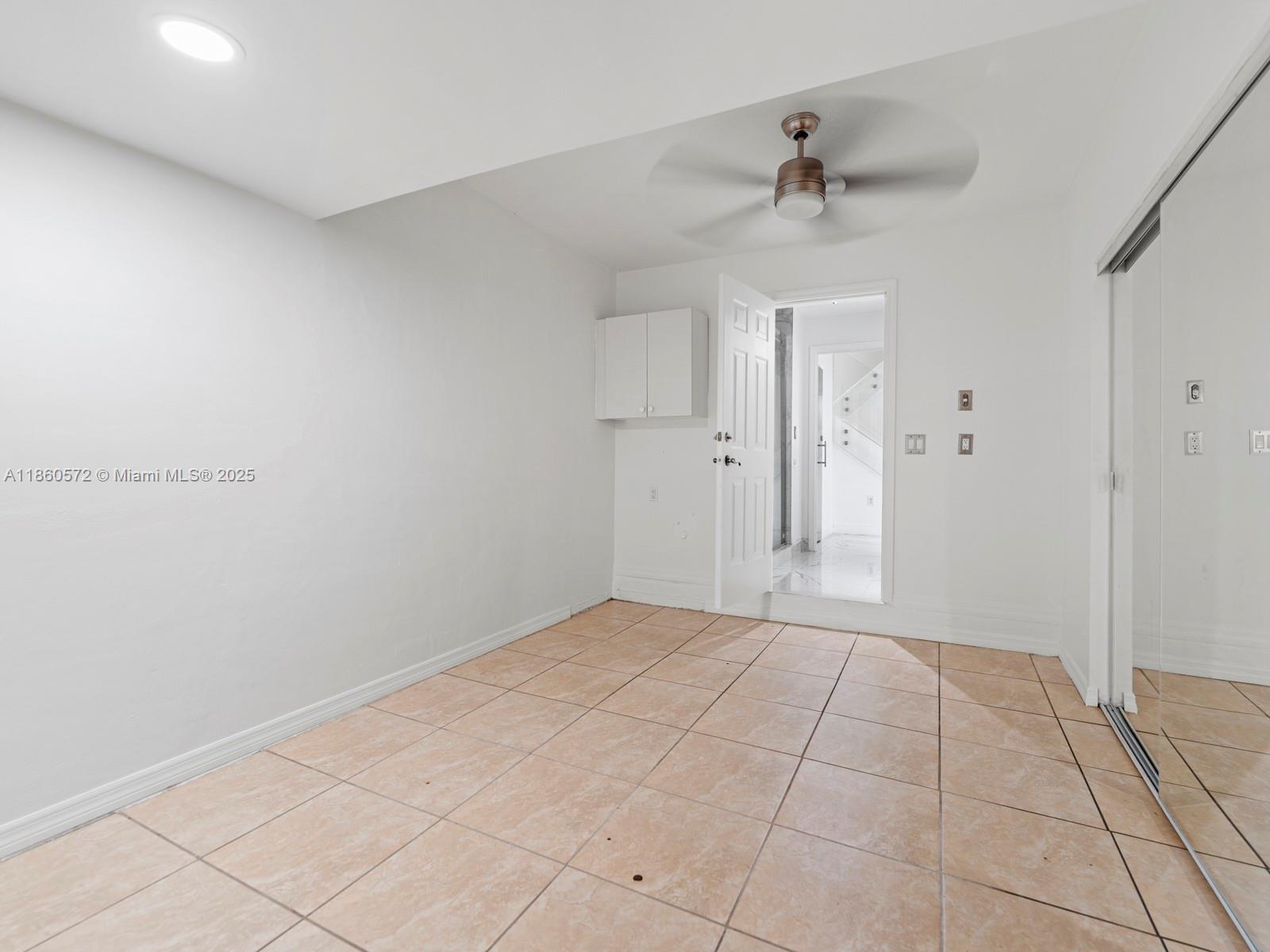 16544 Southwest 68th Terrace Miami, FL 33193 - Photo 24 of 32 a view of an empty room