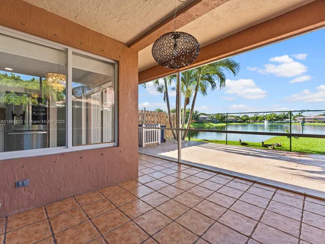 a view of a lake with a yard