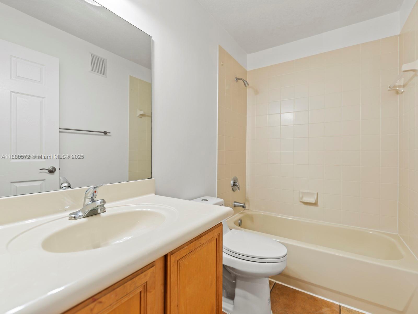 16544 Southwest 68th Terrace Miami, FL 33193 - Photo 32 of 32 a bathroom with a sink toilet and a bathtub