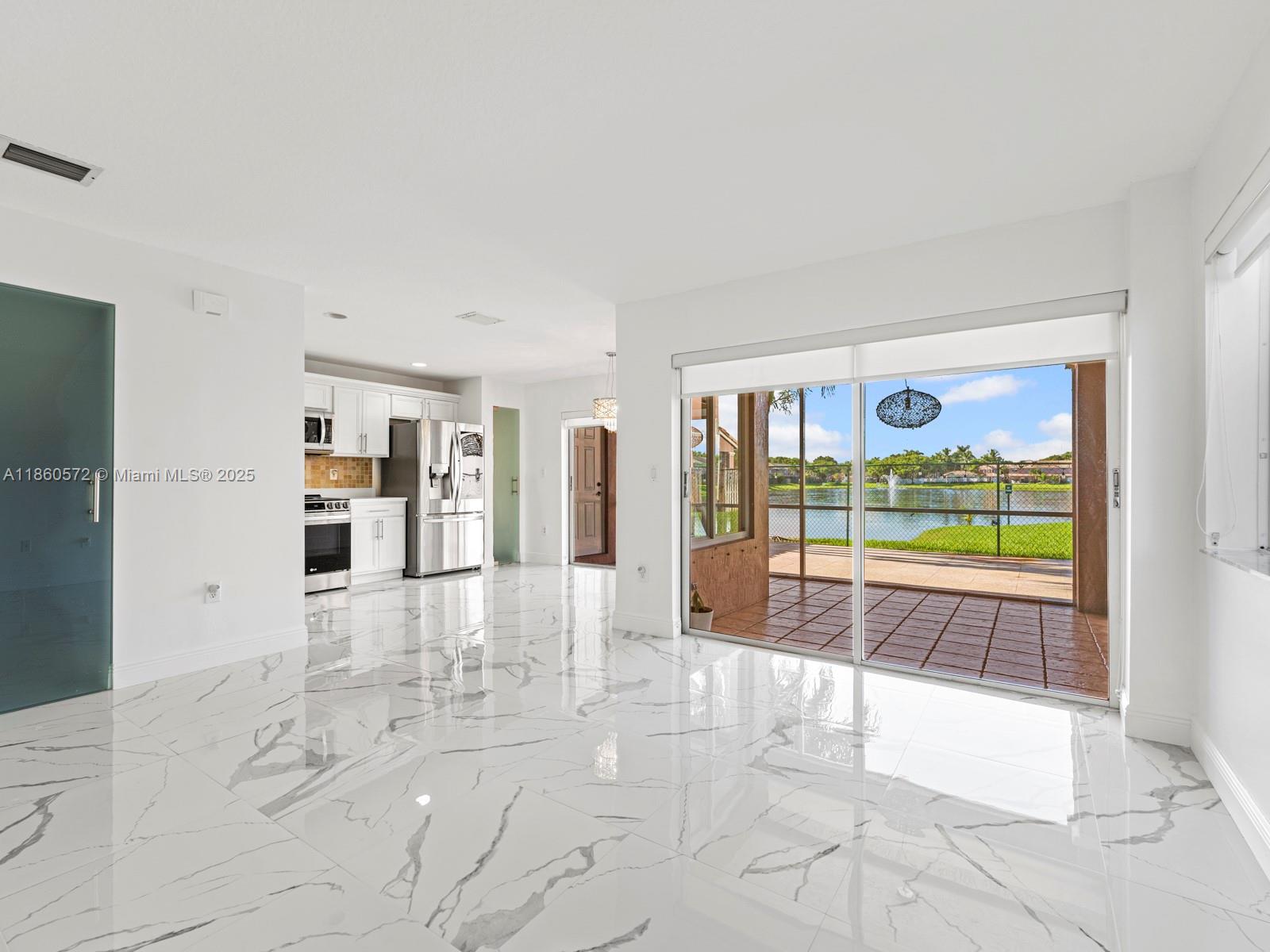 16544 Southwest 68th Terrace Miami, FL 33193 - Photo 8 of 32 a view of a entryway