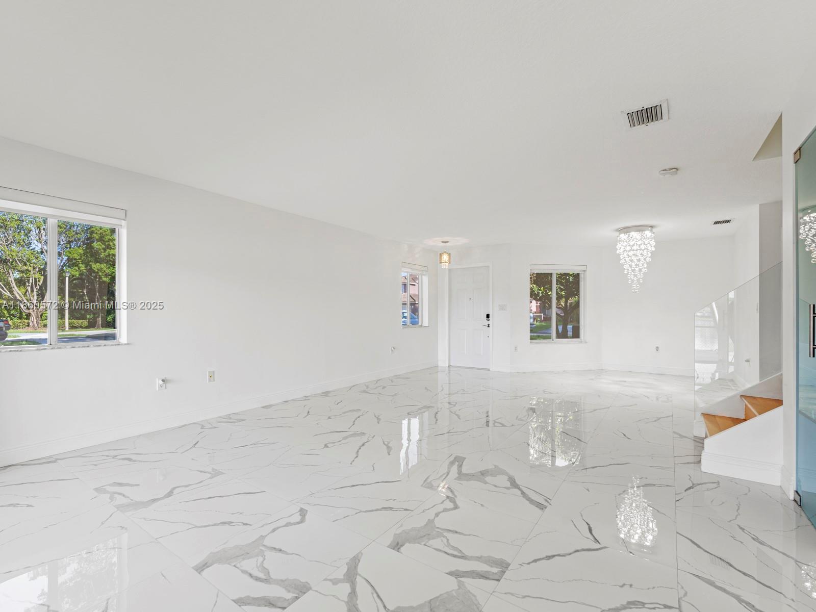 16544 Southwest 68th Terrace Miami, FL 33193 - Photo 9 of 32 a view of an empty room